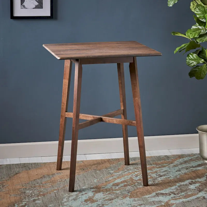 Moderne eettafel op barkrukhoogte van 42, poten van rubberhout en tafelblad van laminaat